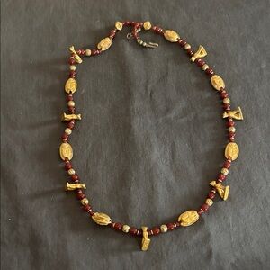 Cat,scarab and stone necklace.